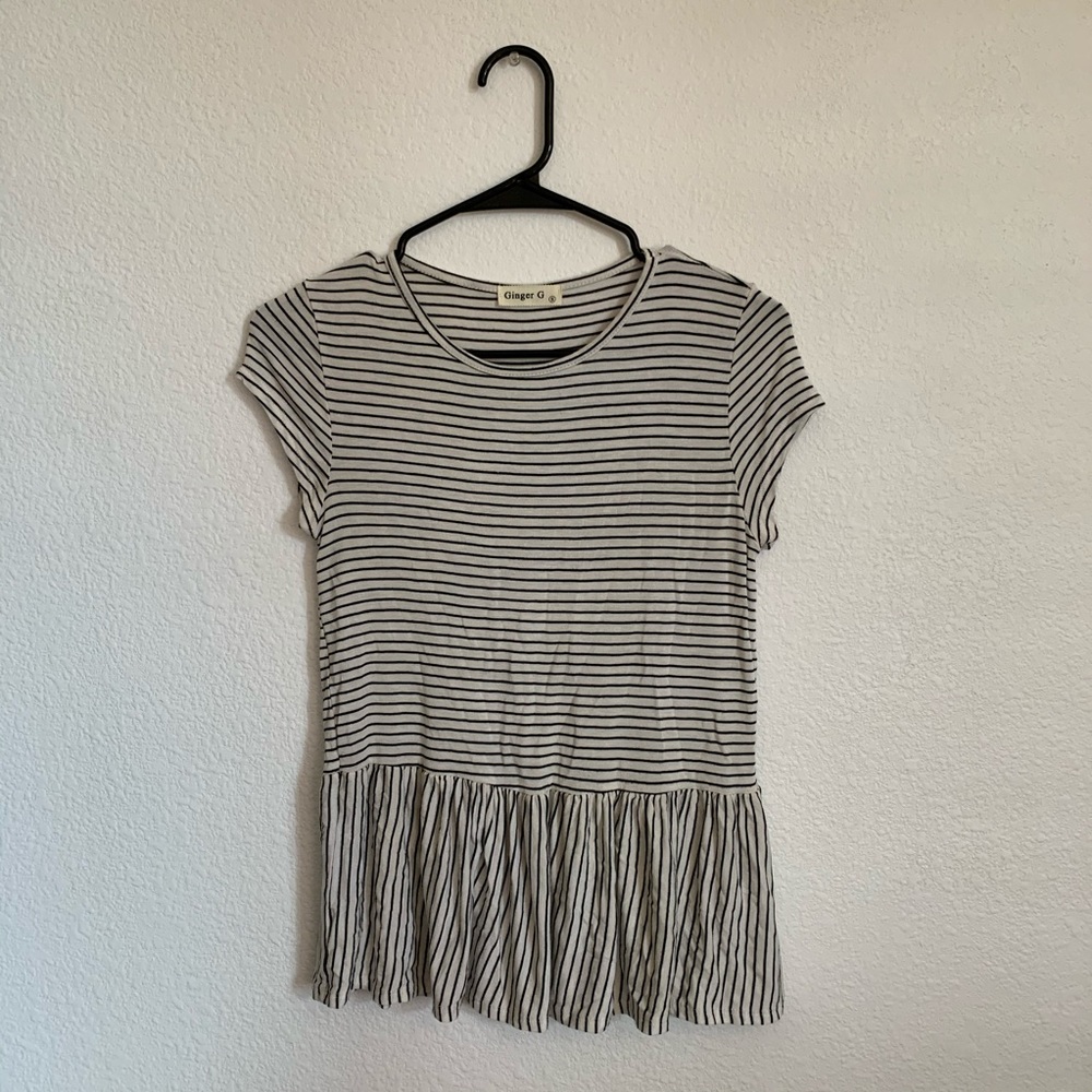 Black and white striped flounce bottom shirt